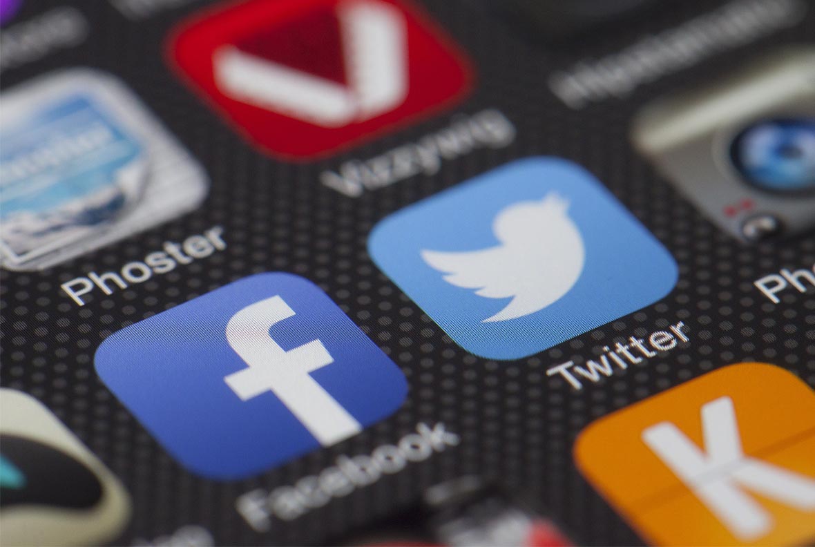 Close-up of social media apps - Facebook and Twitter on a mobile phone. Social media advertising services from Charity Digital Marketing Facebook