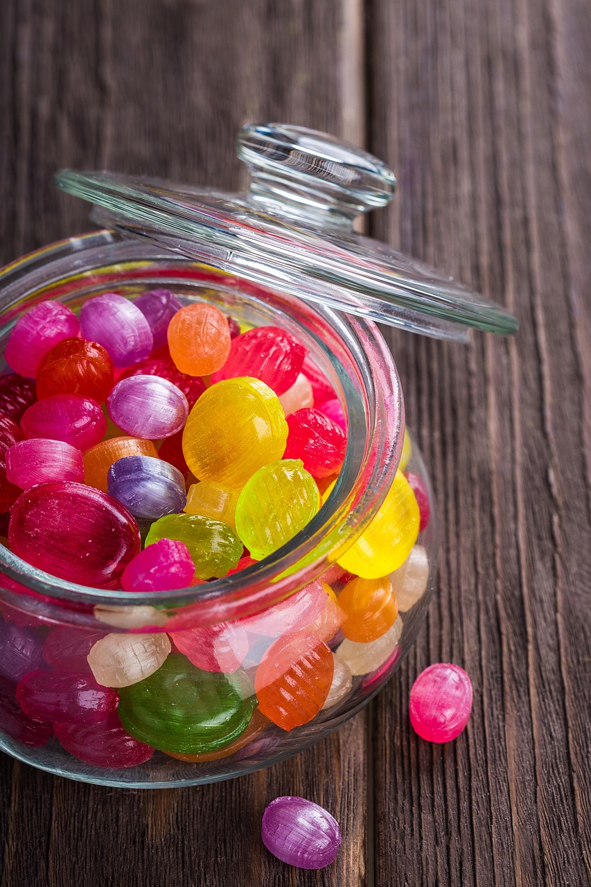 Brightly coloured sweets in a glass jar. Pick and mix charity digital marketing services